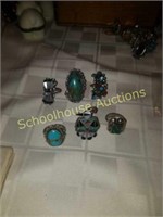 Group of 6 silver and turquoise rings. Most