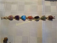 Bracelet with polished stones. Marked made in