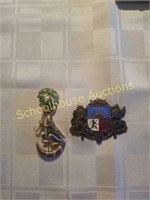 Cat pin made in Spain and coat of arms pin. No