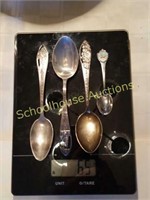 4 sterling tourist spoons.