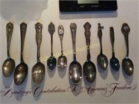 Group of 10 ornate silverplate spoons