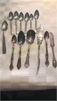 Silver plated spoon and knife group