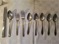 Group of silverplate spoons and forks.
