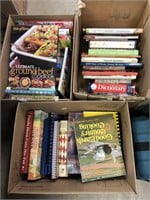 Three boxes of assorted cook books.