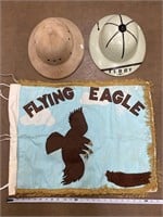 Vintage Flying Eagle banner, safari hats.