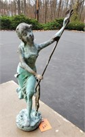 Metal statue of lady with birds