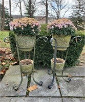 Metal plant stands with flower pots