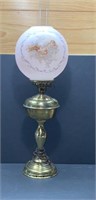 Early brass lamp with cherub shade