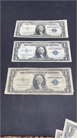 1935e and f blue seal $1 bills