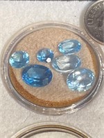 Blue topaz colored cut stones. We are not