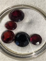 Garnet colored faceted stones