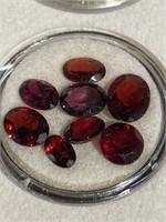 Garnet colored faceted stones