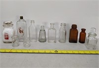 lot of small glass bottles- Edison, Borden, Etc.