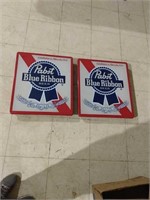 Two Pabst blue ribbon beet signs