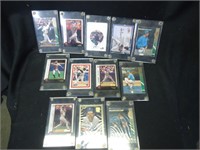 Lot of 12 baseball cards in hard sleeves