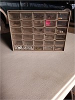 Bolt storage unit with some bolts and screws