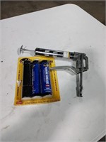 Small grease gun with grease