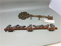 2- vintage metal coat hooks- birds, key