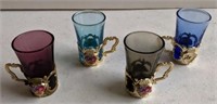 Four Cordial Glasses in Decorative Holders