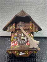 Cuckoo clock with flower design
