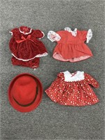 Lot of red doll clothes with red hat