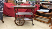Wooden tea serving cart. Measures 29x17x28 inches