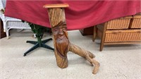 Hand carved wooden stand. Measures 22x14x28.5