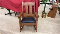 Vintage wooden rocking chair. Measures 26x35x35.5