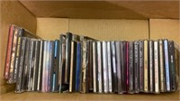 BOX OF CDS AND 007 2009 CALENDAR