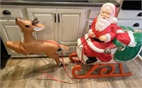 TPI Santa in sleigh with reindeer antlers have