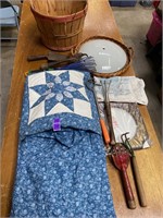vintage basket, blanket pillow and tools