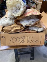 Large box of raw wool