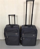 2 23" Rolling Suitcases