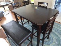 NEAT TABLE WITH 3 CHAIRS AND A BENCH
