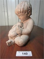Signed Carved Sone Boy with Bunny