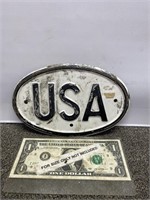 Embossed tin USA license plate topper emblem