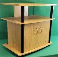 Wooden TV table with plastic legs 24" × 16" and