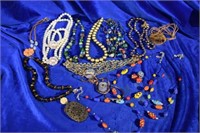 13 costume jewlery necklaces 1 w/matching bracelet