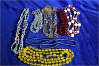 8 vintage costume necklaces