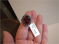 Garnet Ring Size 9 tag reads: German Silver