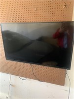42" Vizio TV w/remote - was hanging on wall