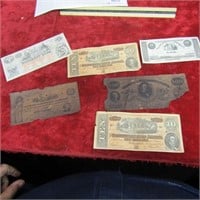 Vintage copy's of confederate money bills.