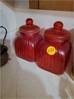 2 RED GLASS CANISTERS