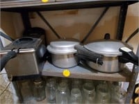 CONTENTS OF SHELF - PRESSURE COOKERS AND FRYER