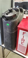Fire alarm telephone and hard plastic gas can