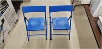 2 blue child's fold up chairs plastic seat and
