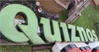 green quiznos sign 24" x 125"