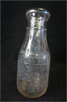 Glass Milk Bottle with North Carolina 5Cents on it
