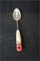 Red Handled Slotted Spoon
