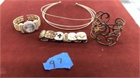Assorted bangle bracelets and necklaces